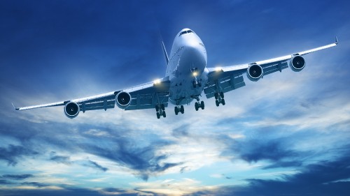 Image white airplane under blue sky during daytime