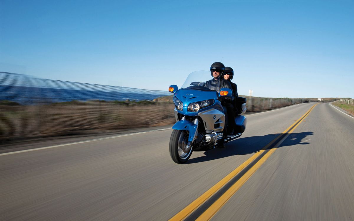 Man in Black Jacket Riding Blue Sports Bike on Gray Asphalt Road During Daytime. Wallpaper in 2560x1600 Resolution