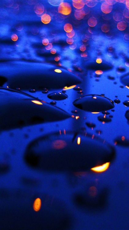 blue and white bubbles with water droplets