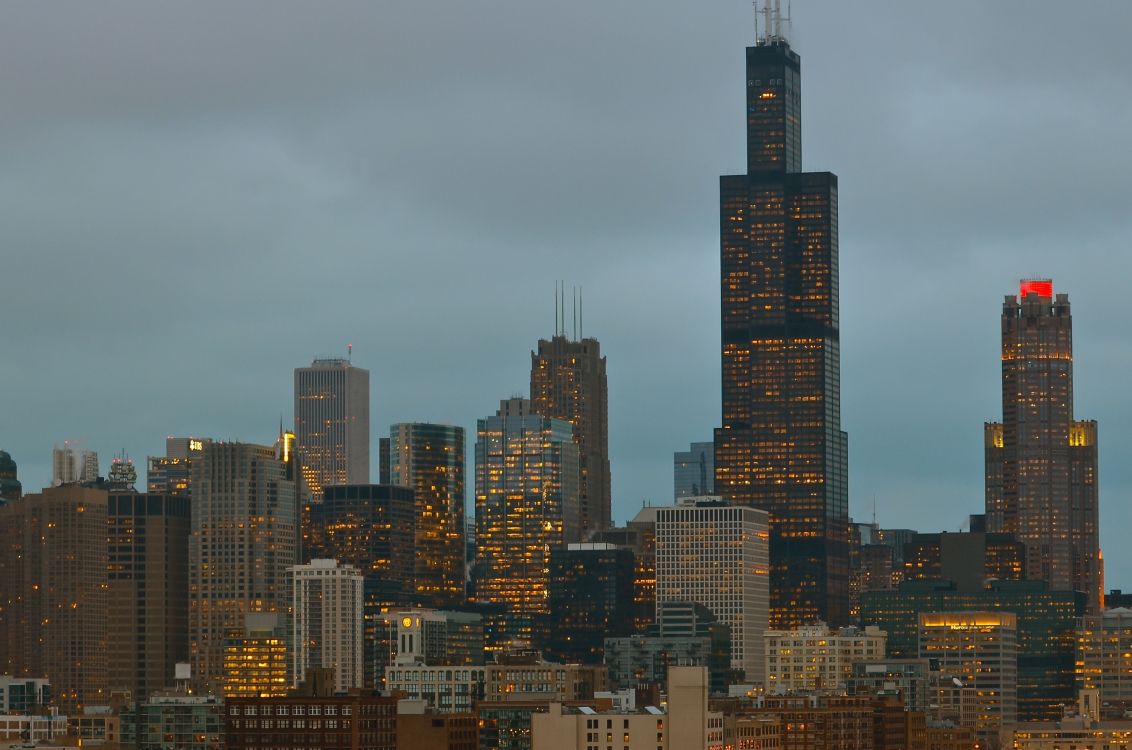 city skyline under gray sky during daytime