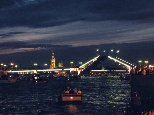 Image people riding on boat on water during night time