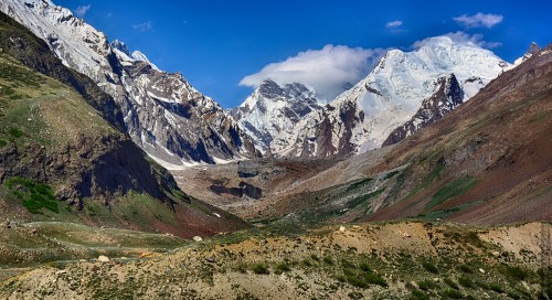 Image gray and white mountains under blue sky during daytime